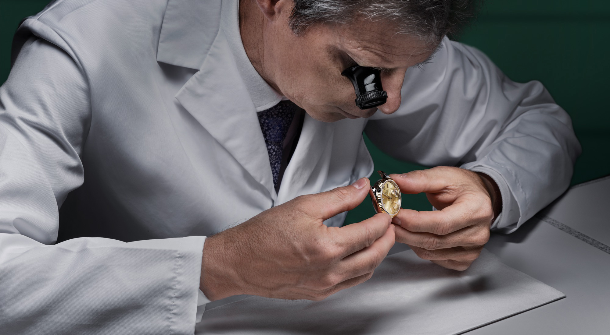 Rolex watch examined by a watchmaker