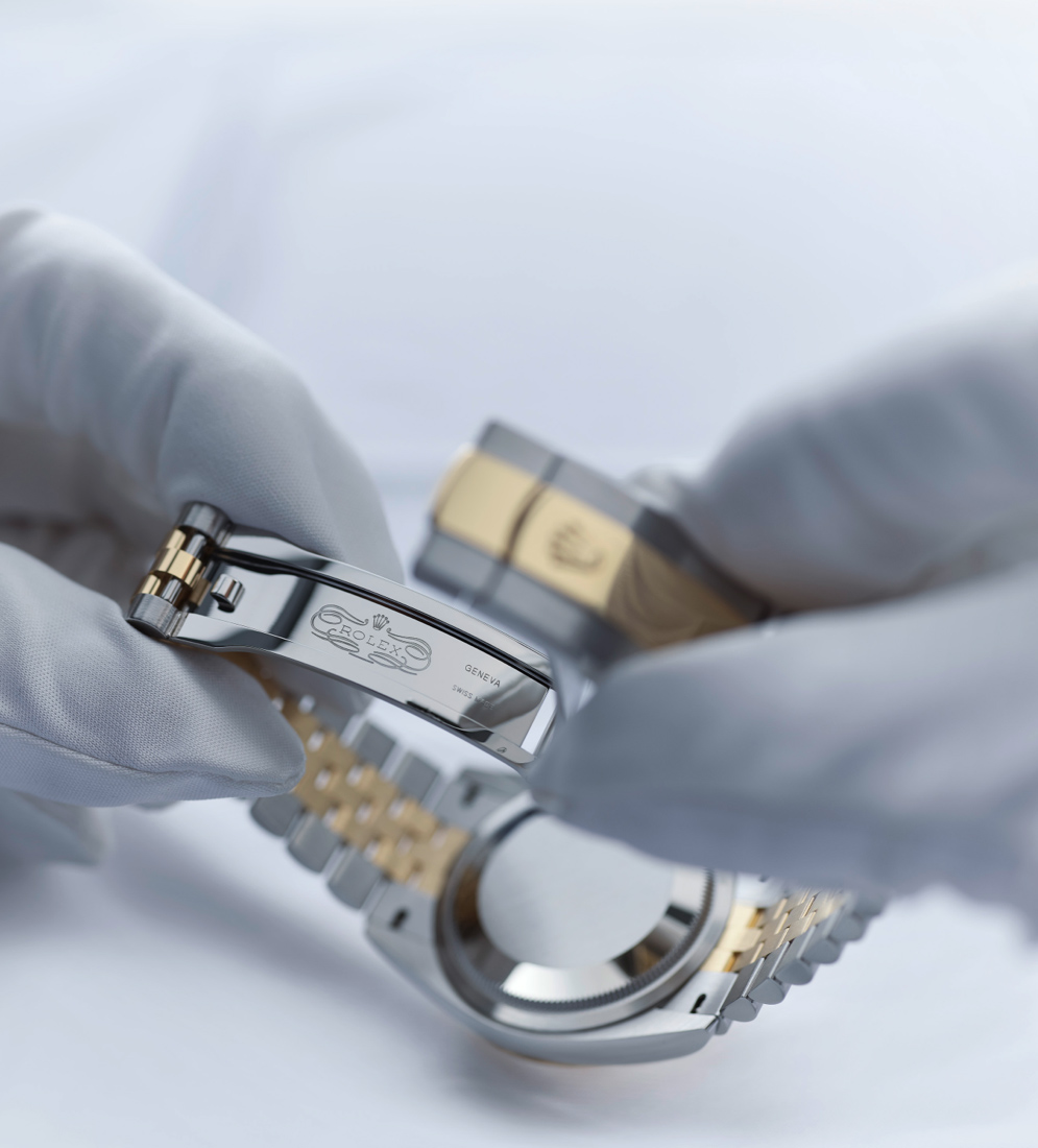 Rolex watchmaker ensures the watch is functioning perfectly