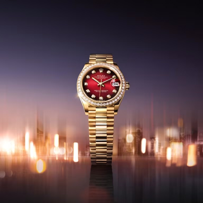 Rolex Datejust in yellow gold, striking red ombré dial with diamonds