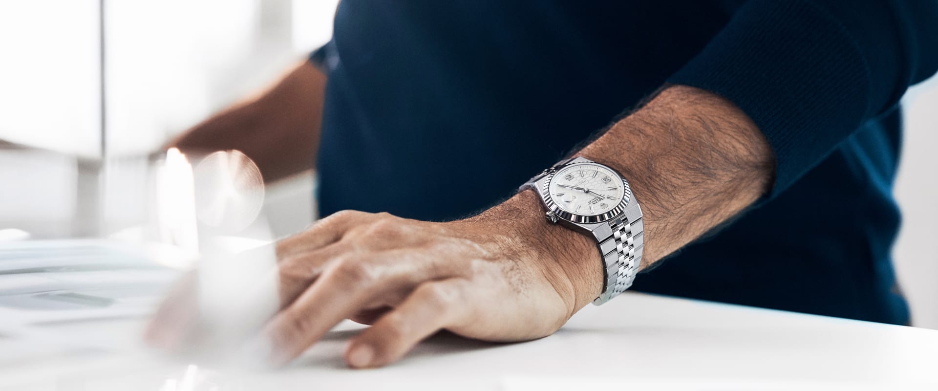 Rolex Land-Dweller Oystersteel and white gold sitting on wrist